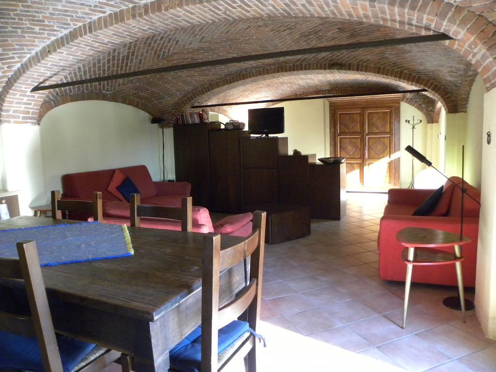 Agriturismo Fano'S Farm Suno Room photo