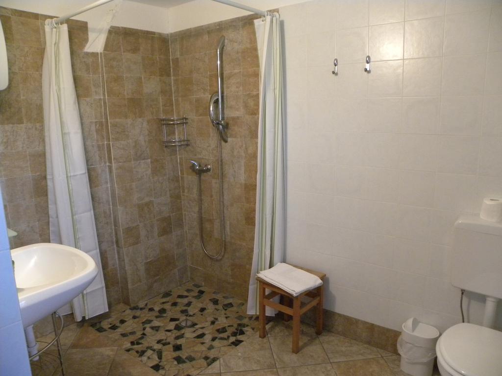 Agriturismo Fano'S Farm Suno Room photo